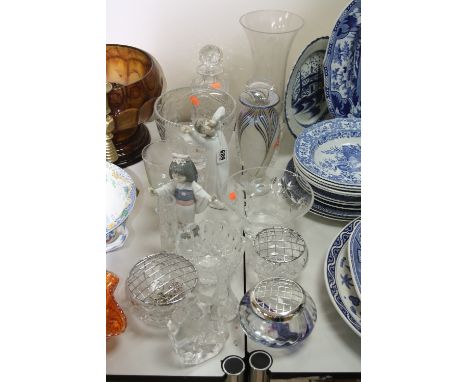 TWO LLADRO FIGURES, boy yawning and an oriental child with flowers, together with glasswares (Caithness, Adrian Sankey etc)