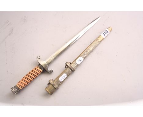 A GERMAN WWII 3RD REICH ARMY OFFICERS DAGGER, believed to be a replica blade marked F W Holler - Berlin