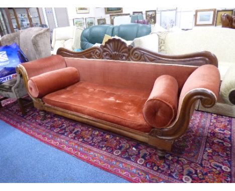 A VICTORIAN WALNUT SCROLL ARM SOFA, raised on turned legs