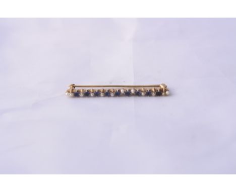 A SAPPHIRE AND PEARL BAR BROOCH, with alternate pearls and light blue sapphires, length 4.3cm, mark to clasp