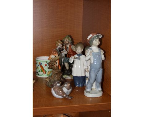 SIX ORNAMENTAL/MUG ITEMS, to include Lladro figure 'Boy from Madrid' No.4898, Nao choir group, Copenhagen bird group, Capodim