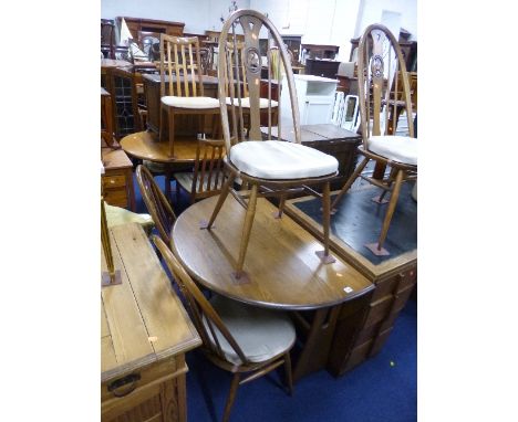 AN 'ERCOL' DROP LEAF TABLE, approximate extended size length 120cm x width 106cm x height 73cm and four spindle back chairs w