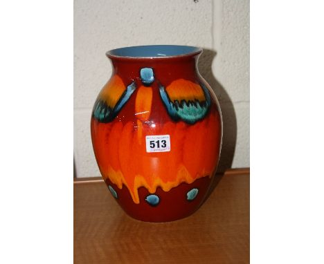 A POOLE POTTERY LIVING GLAZE VASE, of baluster form, decorated in the abstract volcano glaze, height approximately 25cm