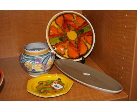 FOUR PIECES OF POOLE POTTERY, to include Carter, Stabler Adams Ltd vase, height approximately 10.5cm