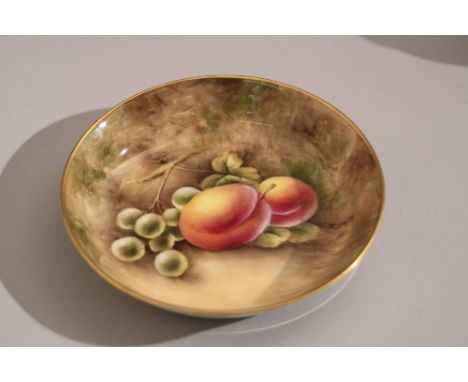 A ROYAL WORCESTER PIN DISH, fallen fruit designed by J. Smith, diameter approximately 11cm