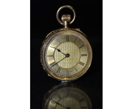 An 18ct gold open faced lady's fob watch, engine turned gilt dial, Roman numerals, minute track, the case rear engraved and c