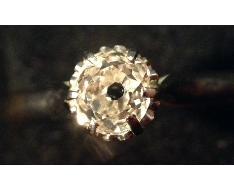 A solitaire diamond ring, cushion cut diamond approx 0.70ct, platinum claws, 18ct gold shank, size M, 3.3g gross