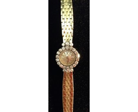 Jaeger-le-Coultre - a Lady's 18ct gold and diamond cocktail watch, circular silvered dial, Arrow and Dot baton markers, manua