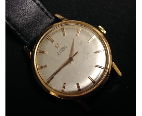 Omega - a vintage 1960s 18ct gold automatic wristwatch, textured silvered dial, baton markers, centre seconds, automatic move