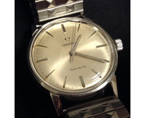 Omega - a vintage Seamaster Geneva wrist watch, silvered dial, rectangular baton markers, minute track, centre seconds, case 