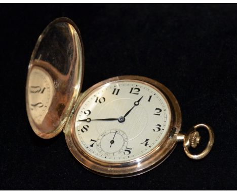 A George V 9ct gold hunter cased pocket watch, Art Deco textured silvered dial, Arabic numerals, minute track, subsidiary sec