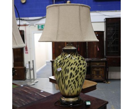 Uttermost Malawi cheetah print table lamp with hessian shade. All electrical items in this lot have been PAT tested for safet