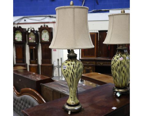 Uttermost Malawi cheetah print table lamp with hessian shade. All electrical items in this lot have been PAT tested for safet