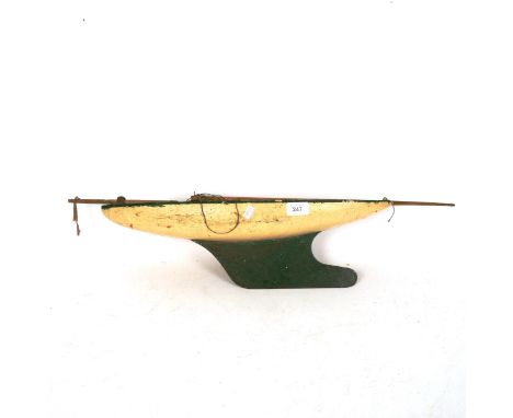 A Vintage painted wooden-hulled pond yacht, length 53cm 