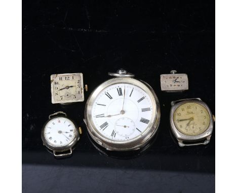 An engine turned silver-cased key-wind pocket watch, an early 20th century silver-cased wristwatch with hour red hour mark, a