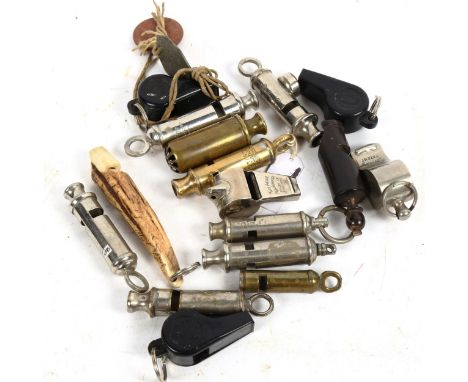 A group of whistles, including Scout, and compass 