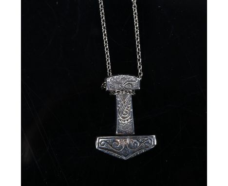 A sterling silver Viking Revival "Thors" hammer pendant, and a silver necklace 