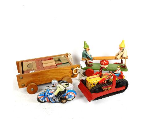 A Vintage pull-along gnome see-saw toy, tinplate motorcyclist etc 