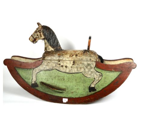 A child's Vintage painted wood rocking horse, length 103cm