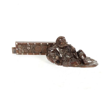A Chinese carved hardwood reclining man figure, and a mother-of-pearl inlaid panel, length 44cm (2) 