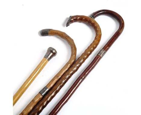 4 Vintage walking sticks and canes with silver mounts 