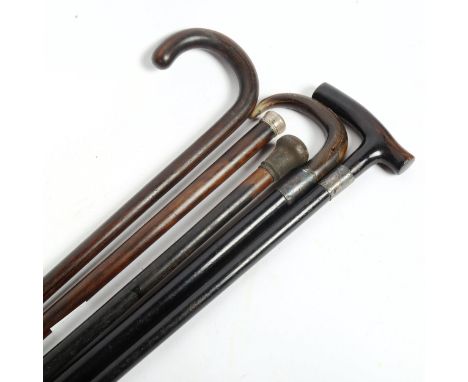 5 Vintage walking sticks and cans, including rosewood and silver collars 