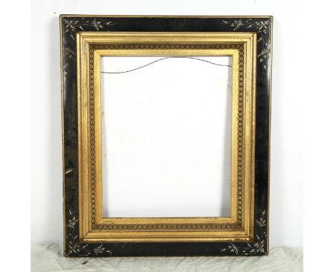 19th century ebony and ivory inlaid picture/mirror frame, overall 73cm x 62cm 