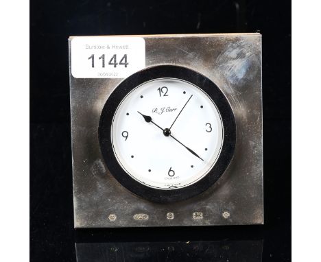 R J CARR - a modern silver-fronted quartz desk clock 