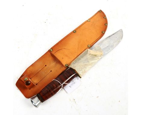 A Vintage hunting knife and sheath, blade length 20cm 