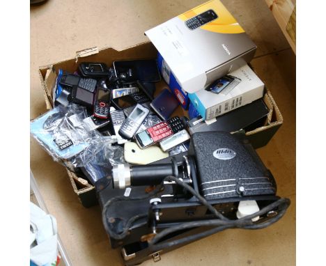 A quantity of mobile phones, Aldis Universal projector, Kindle etc (boxful) 