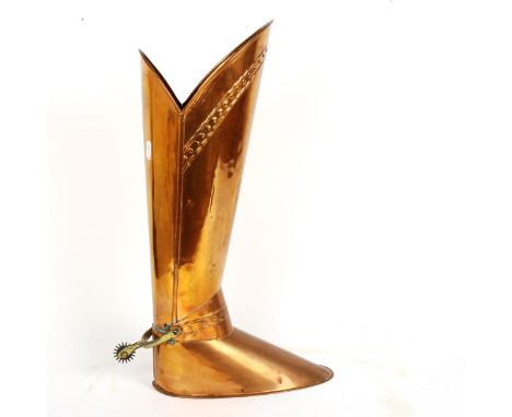 A novelty copper and brass cowboy boot stick stand, with spur, height 52cm 