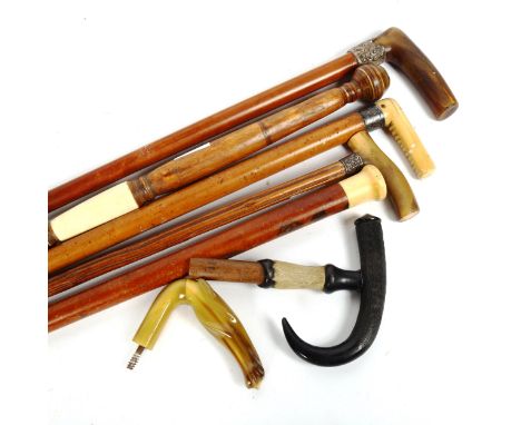 5 Vintage walking sticks, including ivory and staghorn with silver collars, and 3 knops 