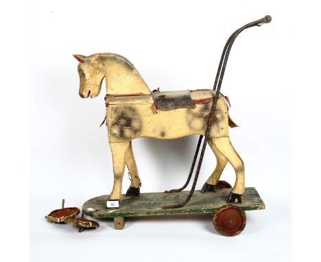 A child's Vintage painted wood push-along horse toy, length 60cm 