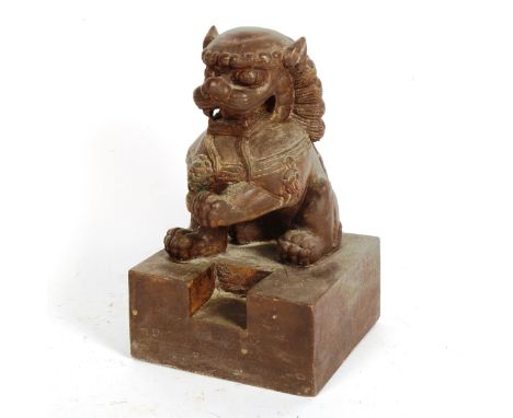 A Chinese carved wood Kylin with 4 character seal mark, height 28cm 