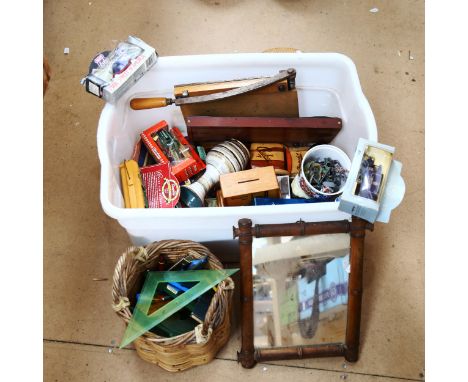 A mirror, a money box, toy cars etc 