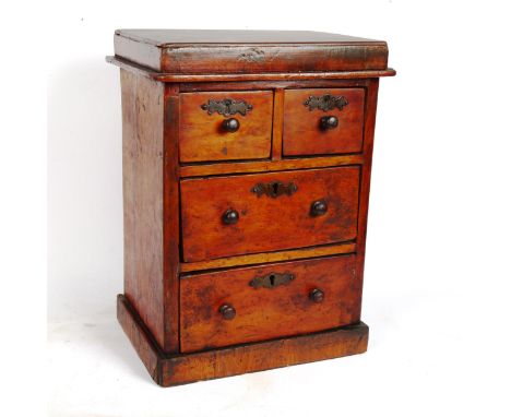 A Vintage stained pine table-top chest of drawers, height 40cm 