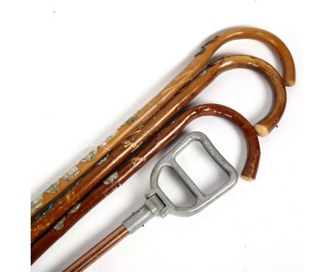 3 Vintage German walking sticks and a shooting stick (4) 
