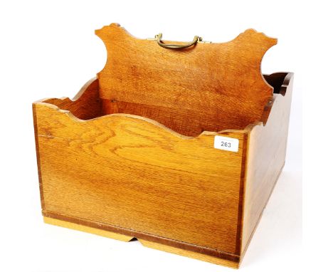 A large light oak bottle carrier, with brass handle, W40cm, H37cm, D45cm 