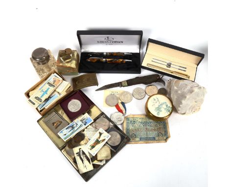 Various collectables, including silver-topped glass inkwell, onyx table lighter, utility knife, CSA buckle, coins and banknot