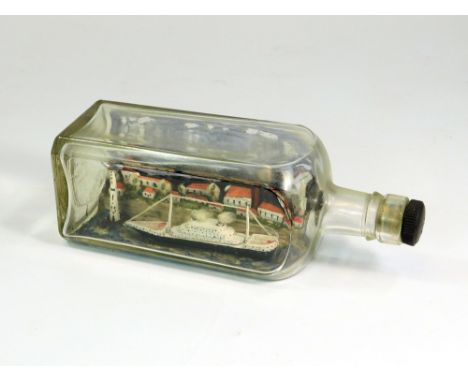 SHIP IN A BOTTLE. A vintage ship in a bottle with lighthouse & town with factory, chimney & windmill beyond. 23cm.  Please no