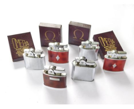 OMEGA LIGHTERS. Six Omega pocket lighters, four are boxed & appear as new & unused. Note: all lighters are used & cannot be g
