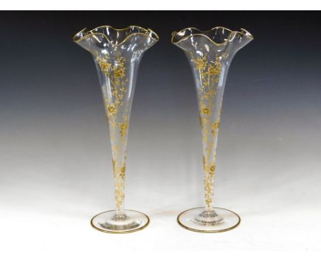 TRUMPET VASES. A pair of early 20th century trumpet vases with gilt floral decoration. Height 30cm.  Please note that all ite