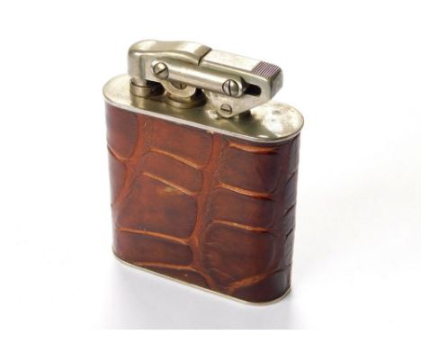 KARL WIENER TABLE LIGHTER. A Karl Wiener table lighter with reptile skin effect finish. Height 10cm. Note: all lighters are u