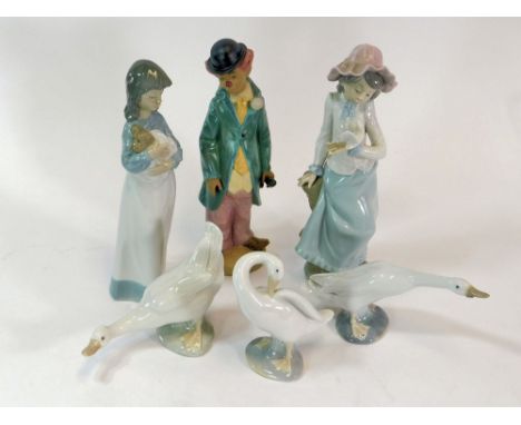 LLADRO FIGURES ETC. A Lladro Circus Sam (The Clown) figure, designed by Francisco Catala, in gres finish. Also, two Nao figur