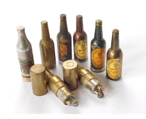 MINIATURE BOTTLE LIGHTERS ETC. Eight miniature novelty & advertising lighters including two brass KEM Inc., Detroit, USA pate