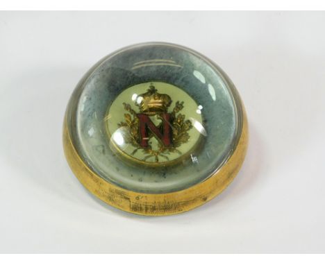GLASS PAPERWEIGHT. A vintage glass paperweight, at the centre an enamelled crest with the initial N, crossed sceptres, an Imp