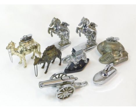 NOVELTY TABLE LIGHTERS ETC. Eight novelty animal & other table lighters. Note: all lighters are used & cannot be guaranteed a