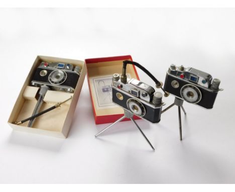 NOVELTY CAMERA LIGHTERS ETC. Three Japanese novelty camera lighters. One in original box, appears unused. Note: all lighters 