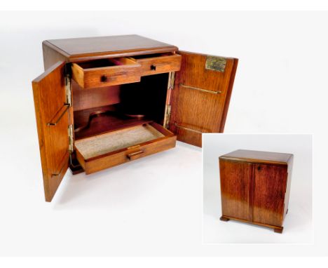 ART DECO CABINET. An oak Art Deco cabinet by Walker & Hall, possibly a table-top cocktail cabinet with an arrangement of thre