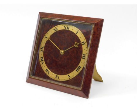 ASPREY MANTEL CLOCK. An Asprey mantel clock in burrwood with applied brass chapter ring, signed Asprey, London, French Escpt.